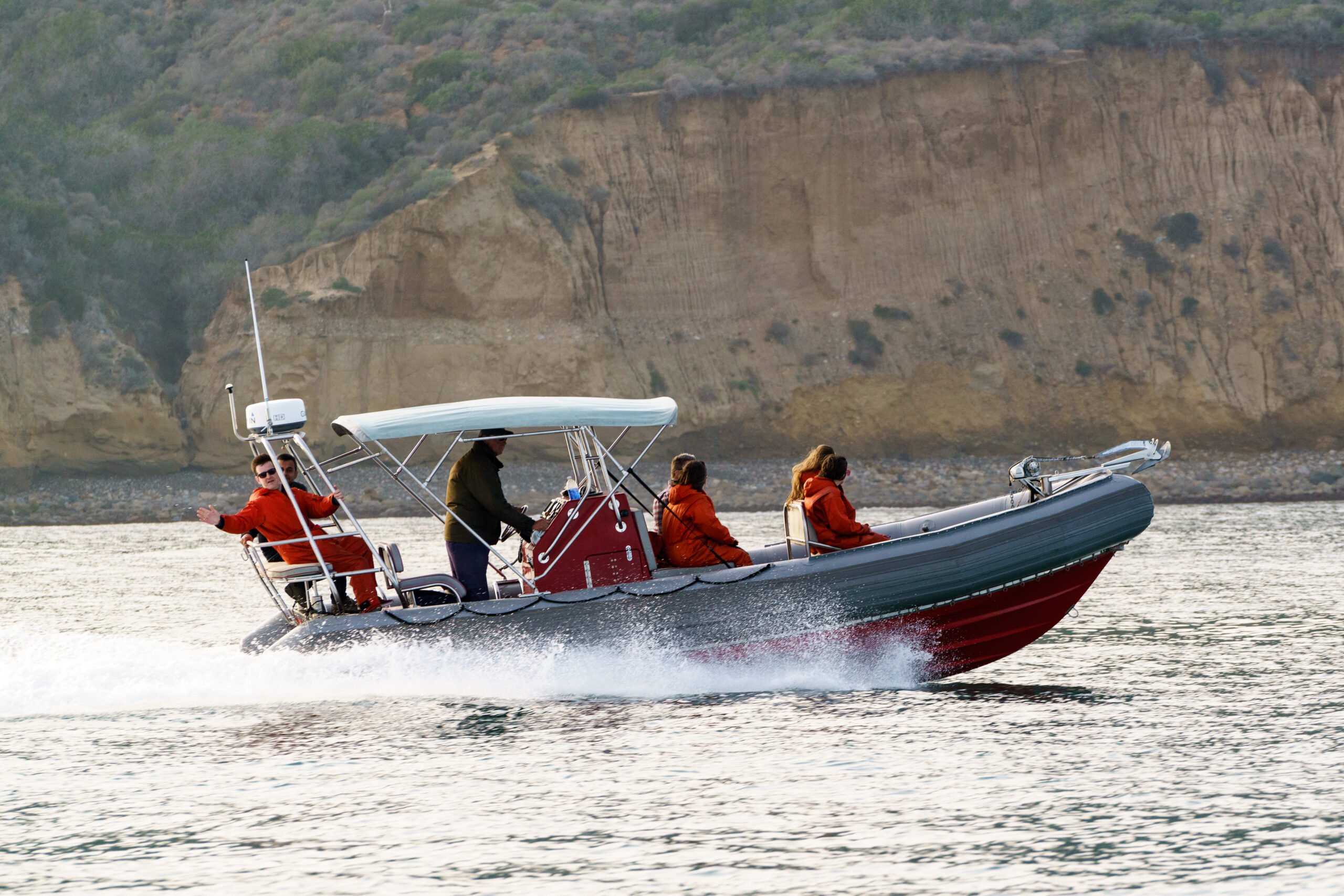 An Adventure Whale Watching rigid inflatable boat under way on the ocean